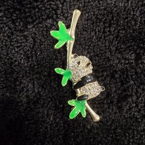 Elegant Panda Brooch with Green Leaves